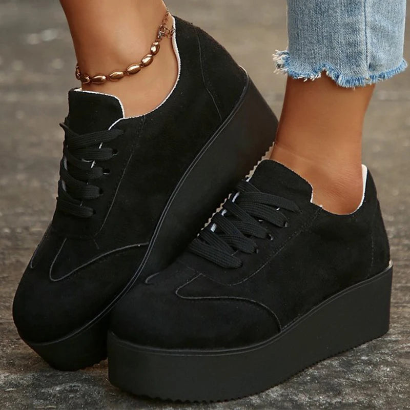Stylish women’s chunky sneakers featuring elevated platform and modern design
